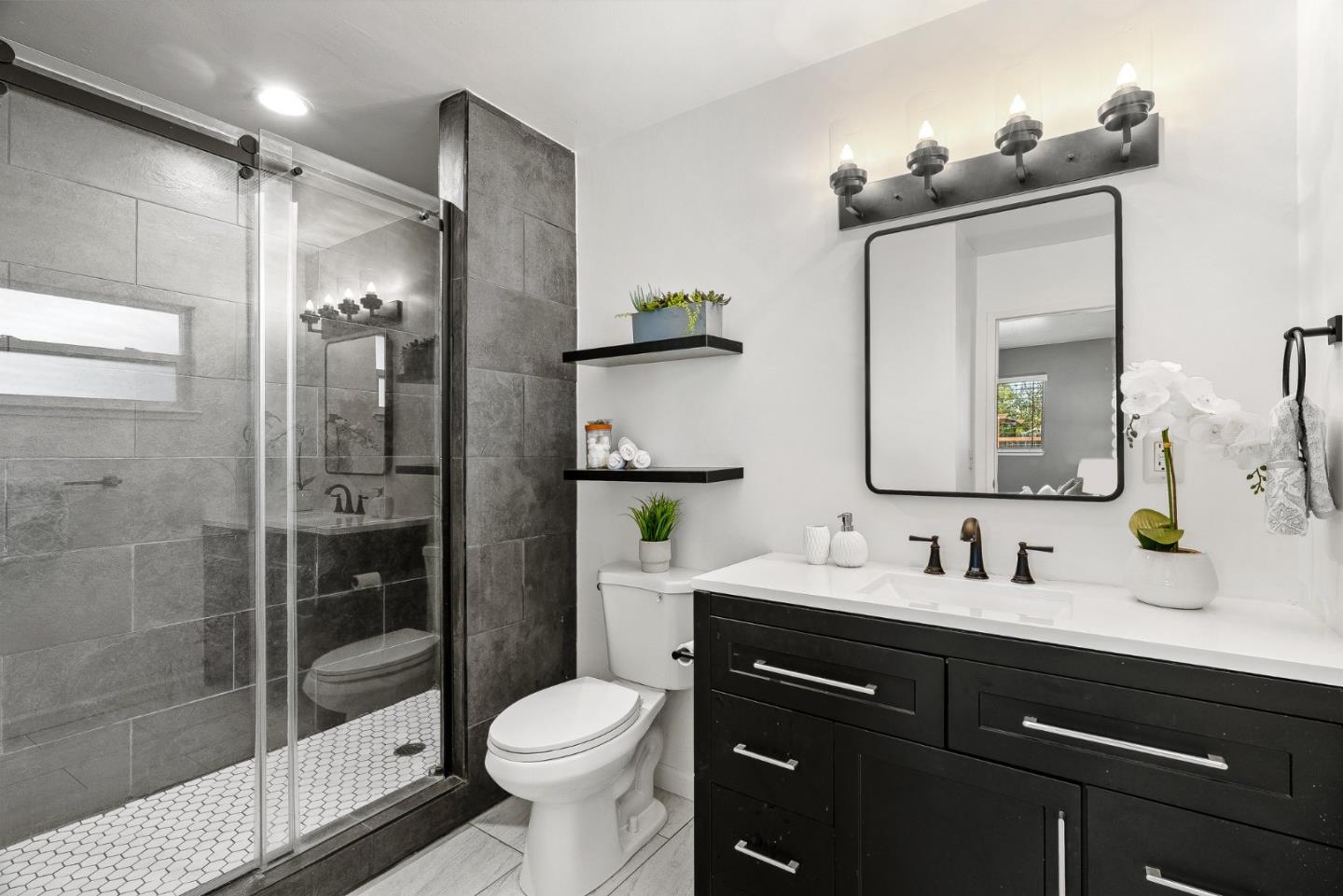 116 Lester Court Watsonville, CA 95076 - Photo 19 of 47 a bathroom with a sink a toilet and shower