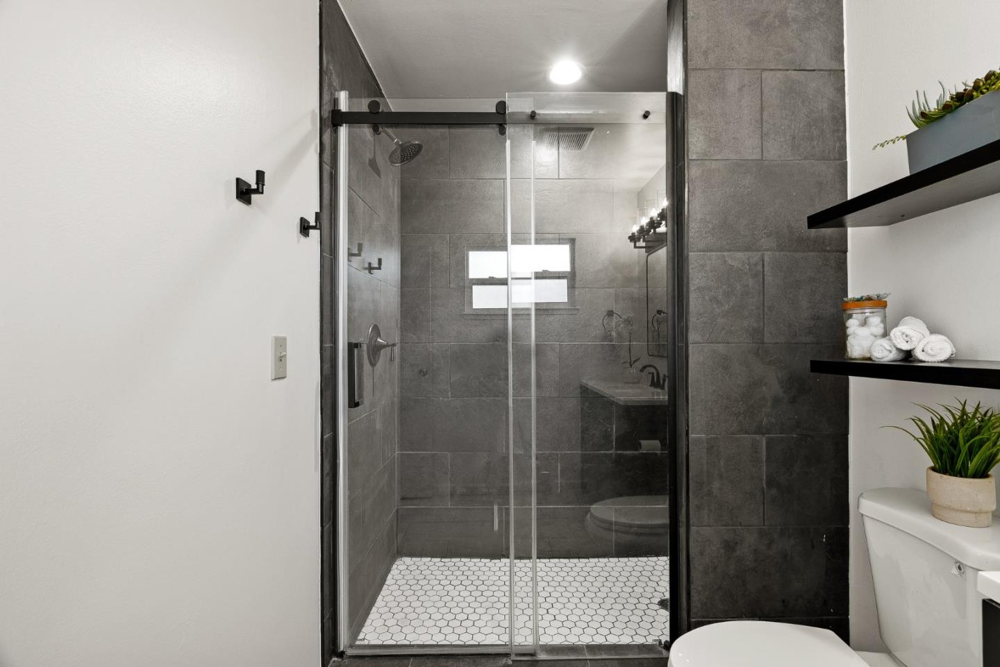 116 Lester Court Watsonville, CA 95076 - Photo 20 of 47 a bathroom with a shower and toilet