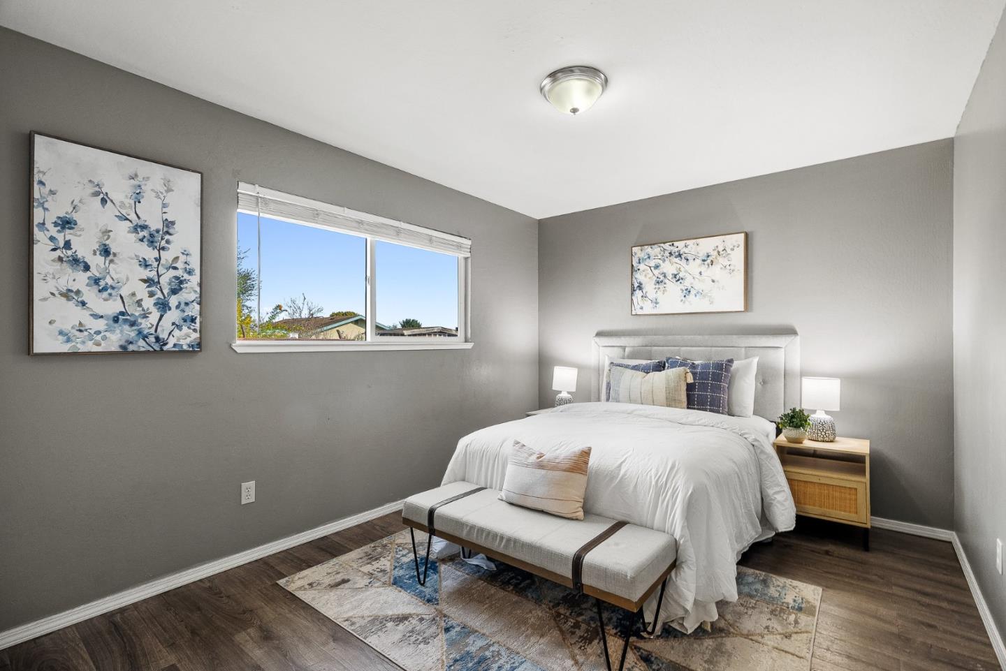 116 Lester Court Watsonville, CA 95076 - Photo 21 of 47 a bedroom with a bed and wooden floor