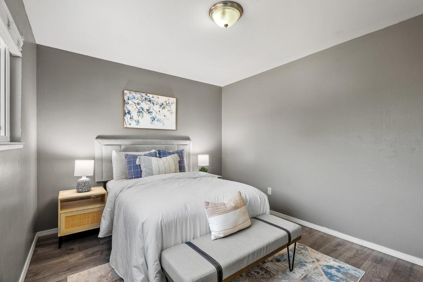 116 Lester Court Watsonville, CA 95076 - Photo 22 of 47 a bedroom with a bed and painting on the wall