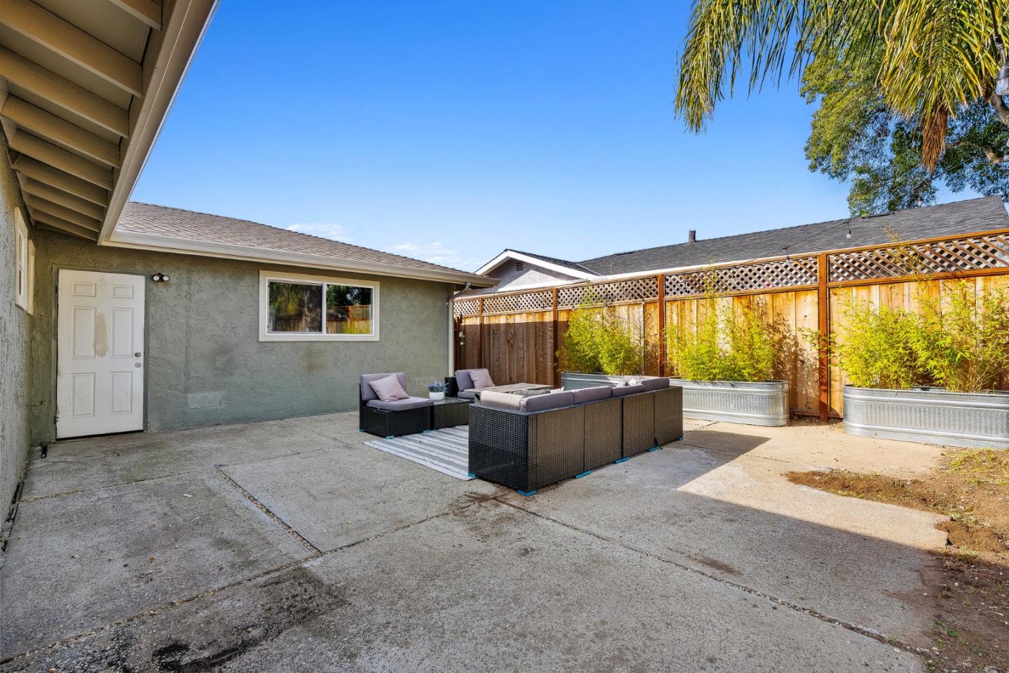 116 Lester Court Watsonville, CA 95076 - Photo 33 of 47 a view of a patio with couches and potted plants