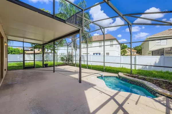 a view of a backyard with porch