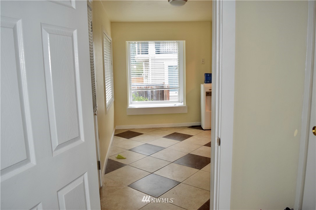 357 Lind Avenue Northwest Renton, WA 98057 - Photo 13 of 27 a bathroom with a sink and a window