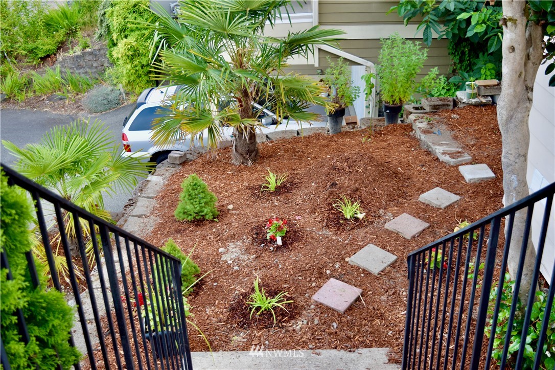 357 Lind Avenue Northwest Renton, WA 98057 - Photo 6 of 27 a view of a backyard with sitting area