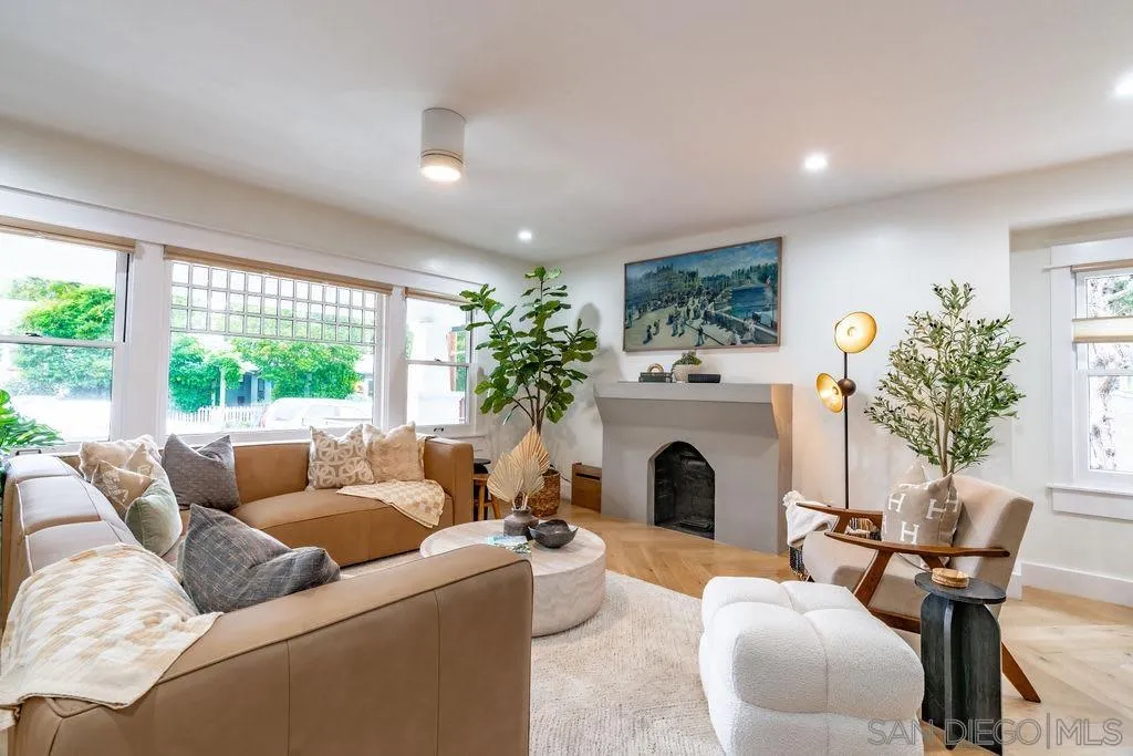 725 Pennsylvania Avenue San Diego, CA 92103 - Photo 20 of 64 a living room with furniture fireplace and potted plants