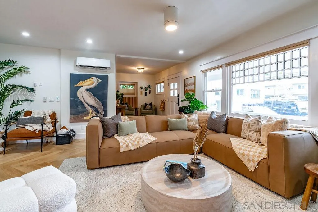 725 Pennsylvania Avenue San Diego, CA 92103 - Photo 21 of 64 a living room with furniture and a large window
