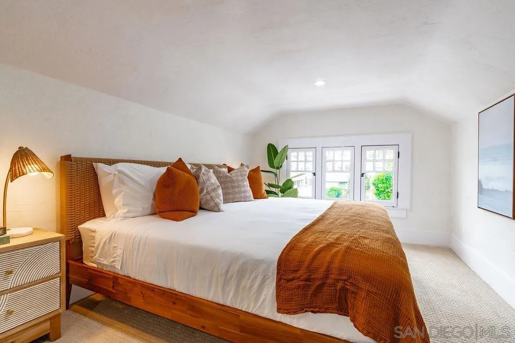 725 Pennsylvania Avenue San Diego, CA 92103 - Photo 46 of 64 a bedroom with bed and window