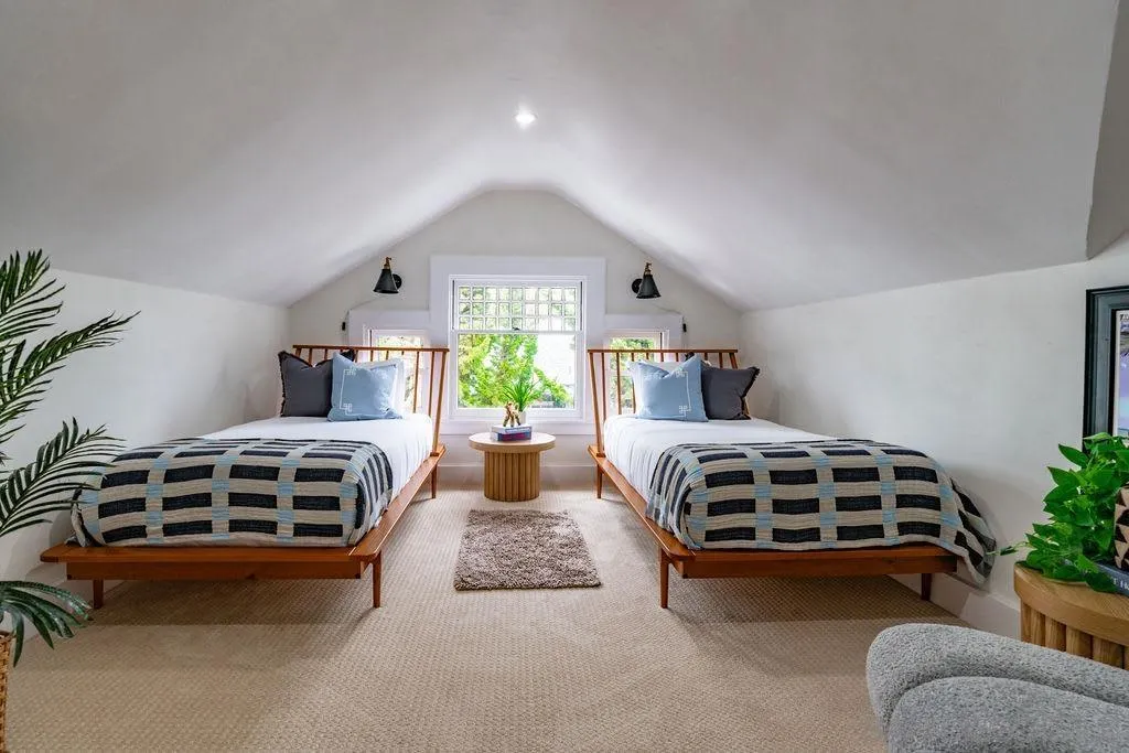 725 Pennsylvania Avenue San Diego, CA 92103 - Photo 50 of 64 a bedroom with a bed and a window