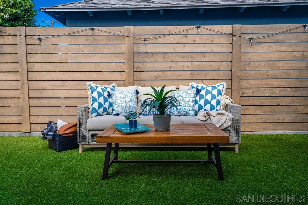 725 Pennsylvania Avenue San Diego, CA 92103 - Photo 10 of 64 a wooden bench sitting in front of a house