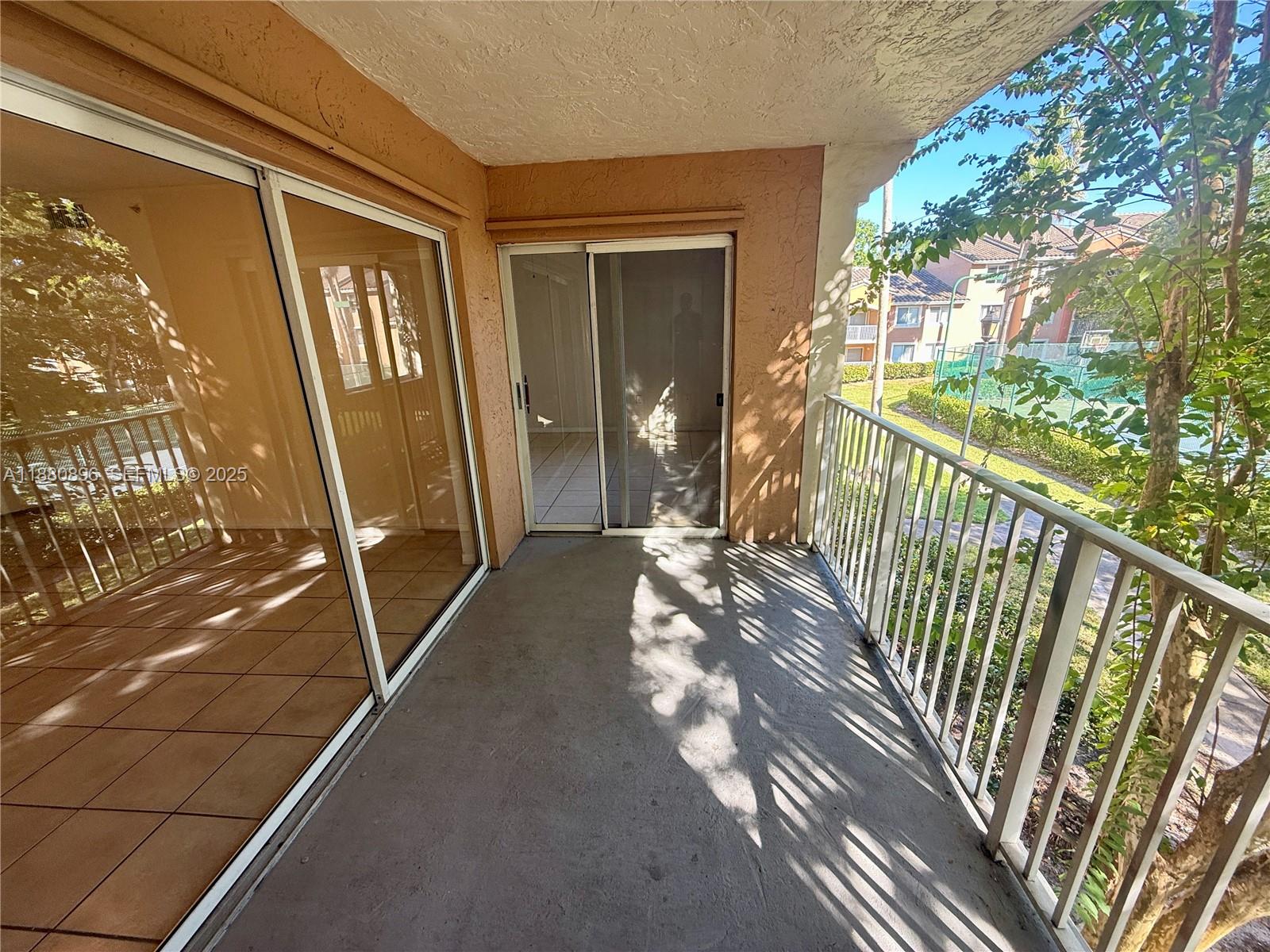 3870 Lyons Road, Unit 2108 Coconut Creek, FL 33073 - Photo 11 of 19 a view of a balcony