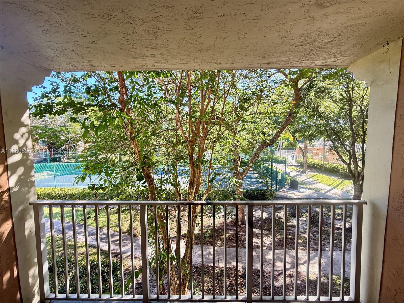 3870 Lyons Road, Unit 2108 Coconut Creek, FL 33073 - Photo 12 of 19 a city view from a balcony