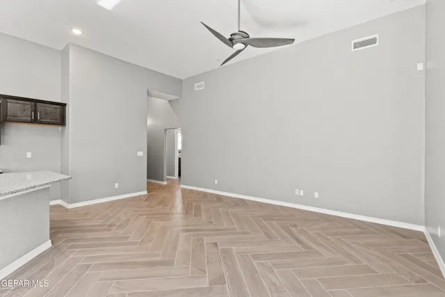 a view of an empty room with a bathroom