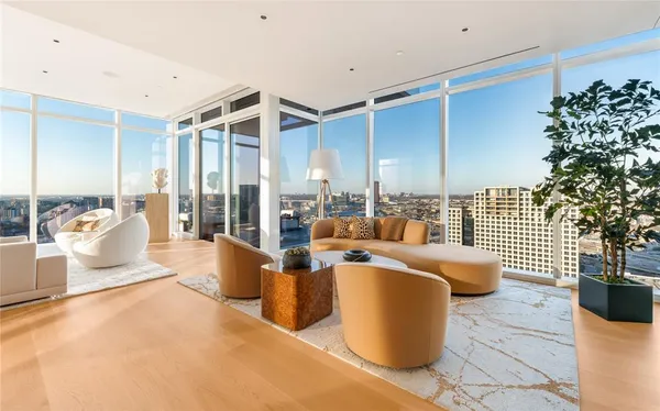 a large living room with furniture