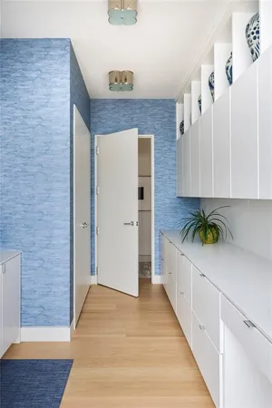 a view of swimming pool with outdoor seating and plants