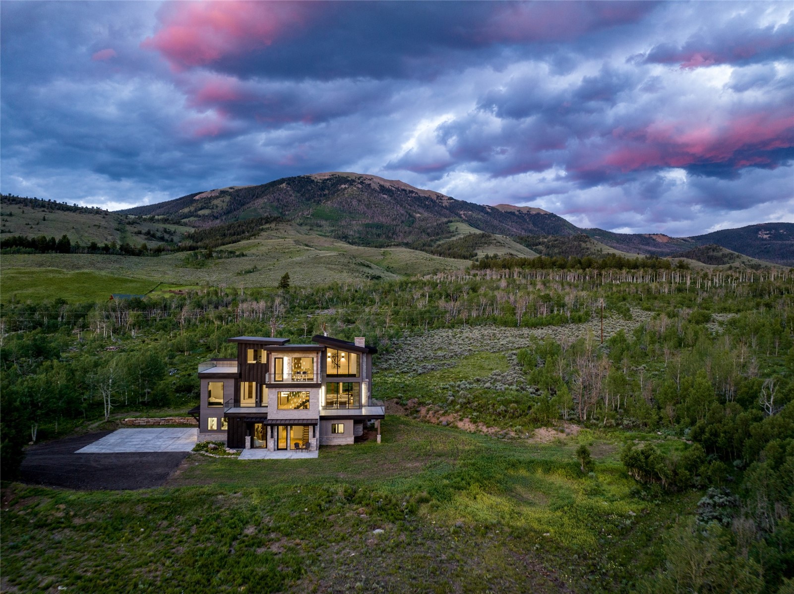 2150 Elk Run Road Silverthorne, CO 80498 - Photo 1 of 29 View of home on the property sitting among the mountains.