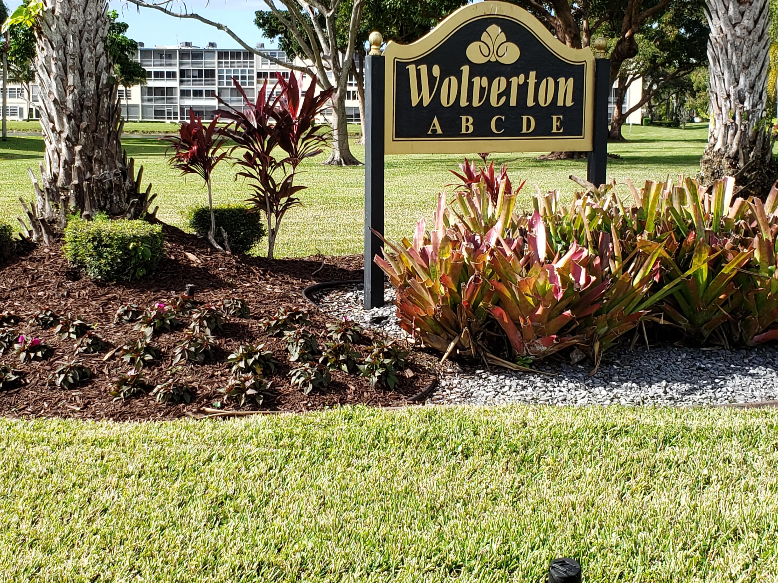 1010 Wolverton East Boca Raton, FL 33434 - Photo 15 of 30 a view of a bench in a garden