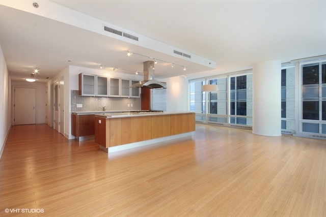 340 East Randolph Street, Unit 1606 Chicago, IL 60601 - Photo 6 of 29 a view of kitchen with cabinets and stainless steel appliances