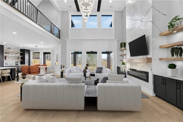 a living room with furniture and a table