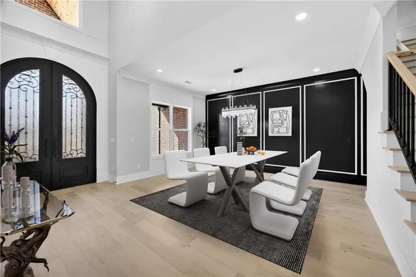 a large kitchen with stainless steel appliances kitchen island granite countertop a sink and cabinets