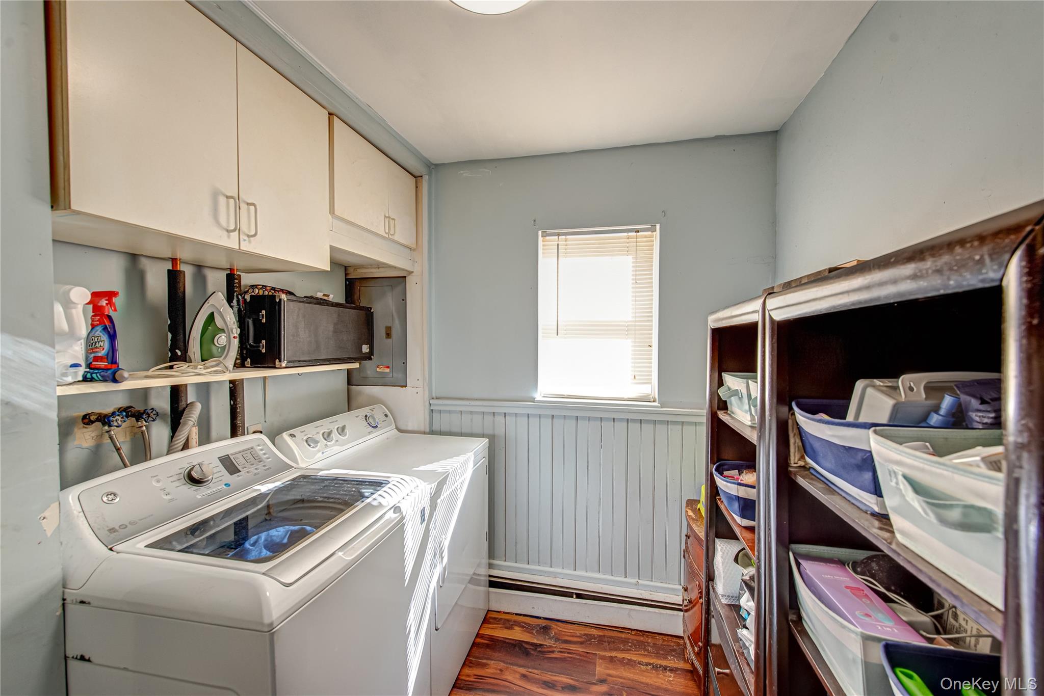137 Wood Road Centereach, NY 11720 - Photo 13 of 16 a utility room with dryer and washer