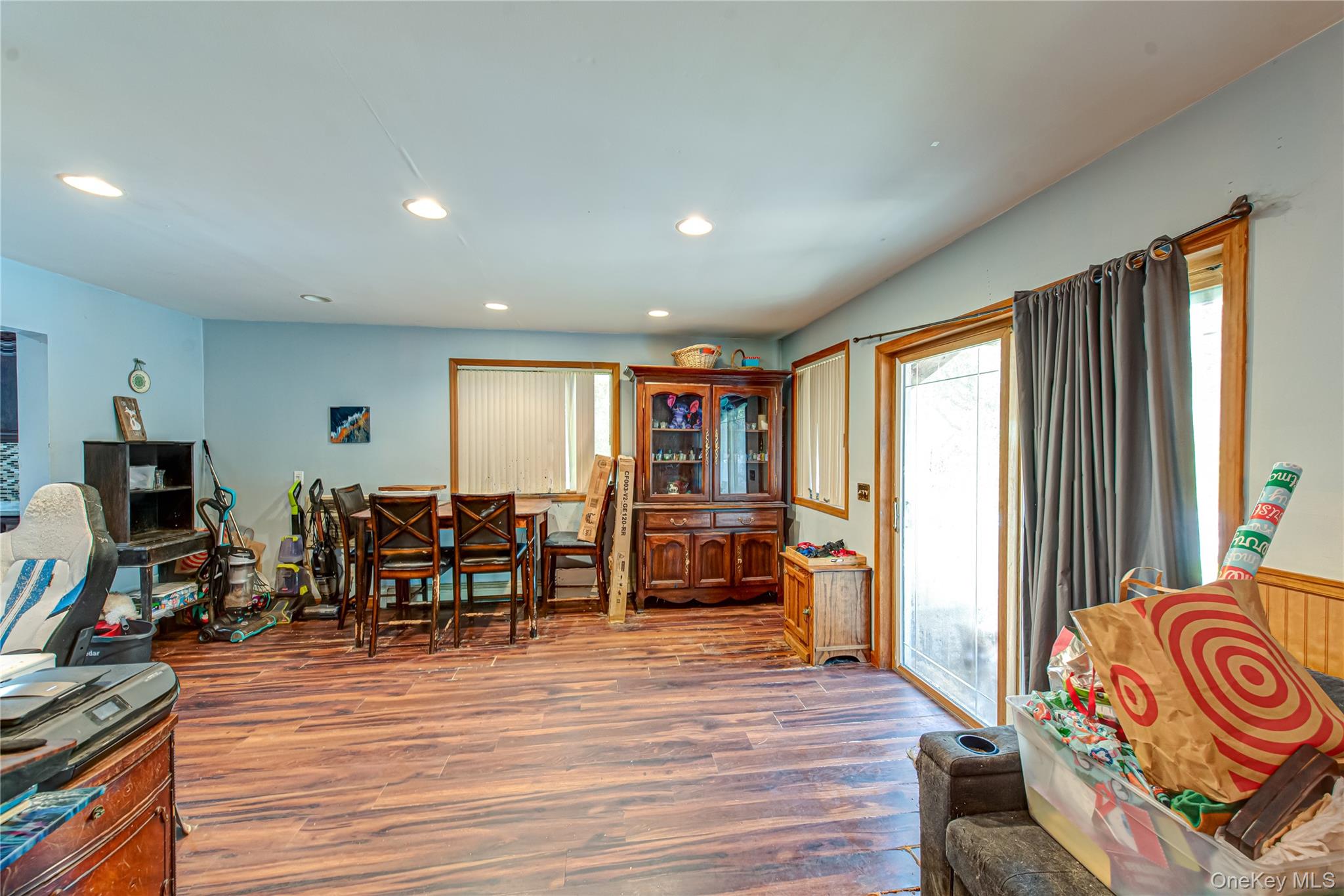 137 Wood Road Centereach, NY 11720 - Photo 10 of 16 a living room with furniture and wooden floor
