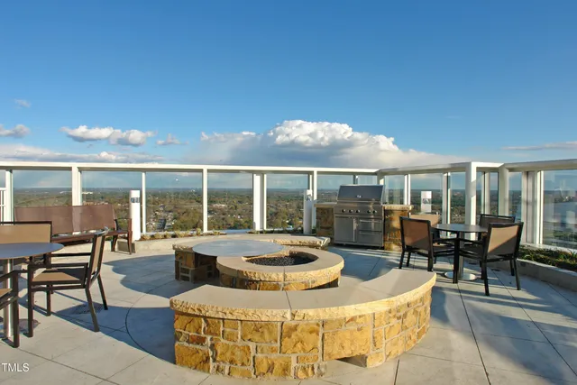 a view of a patio with couches table and chairs