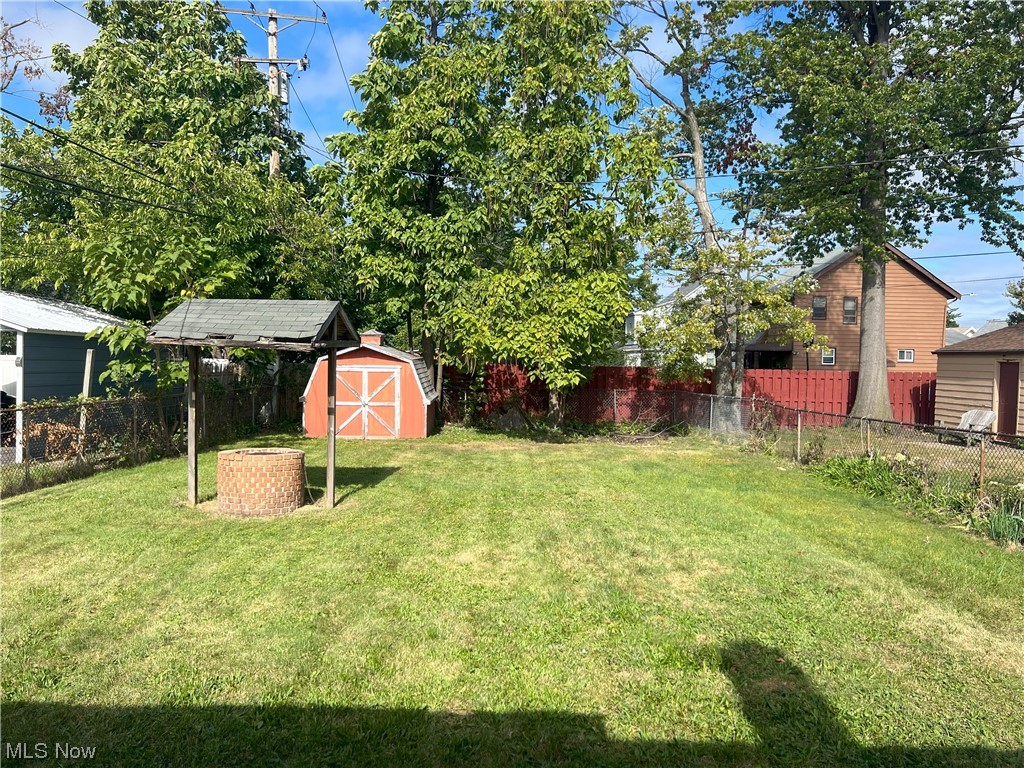 17815 Olympia Road Cleveland, OH 44112 - Photo 3 of 27 View of yard featuring a storage shed