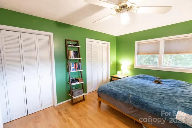 a workspace with furniture window and wooden floor