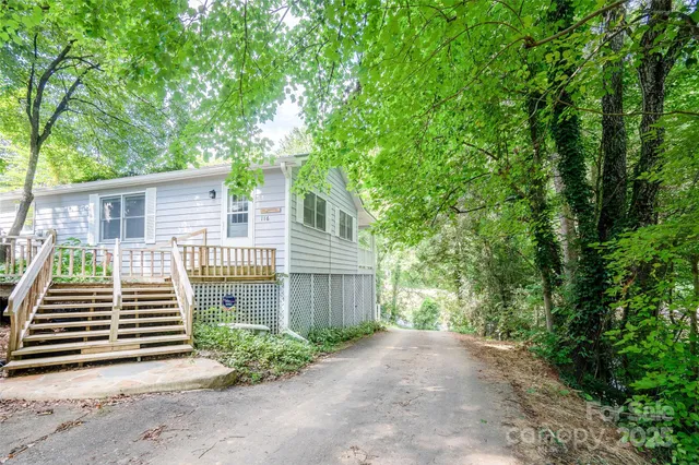 a view of a porch with wooden floor
