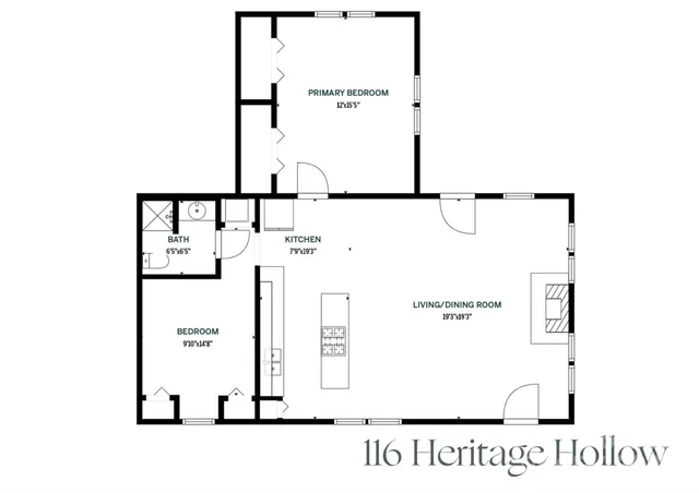 an empty room with windows a fireplace and wooden floor