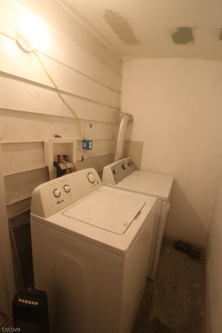 40 Mitchell Street West Orange, NJ 07052 - Photo 16 of 17 a utility room with dryer and washer