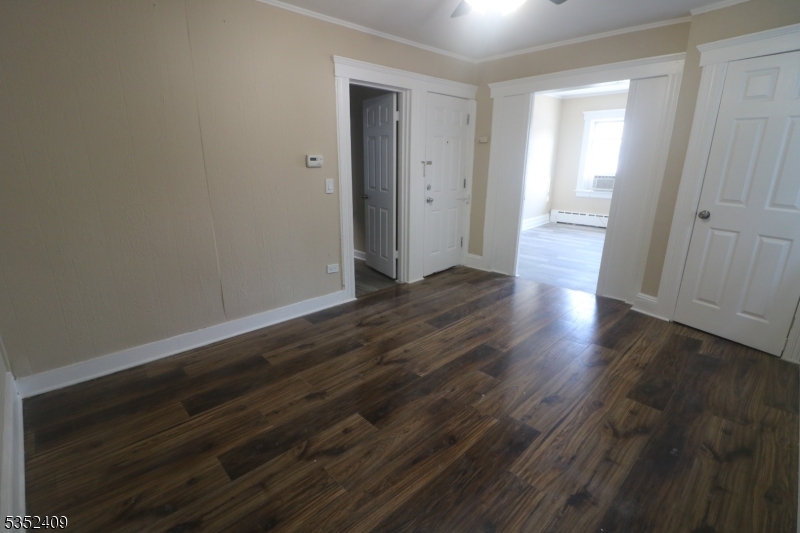 40 Mitchell Street West Orange, NJ 07052 - Photo 8 of 17 wooden floor in an empty room
