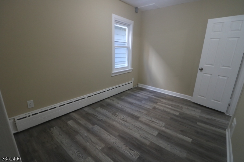 40 Mitchell Street West Orange, NJ 07052 - Photo 9 of 17 an empty room with a window