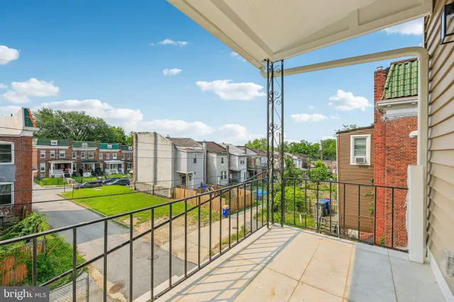 a view of a city from a balcony