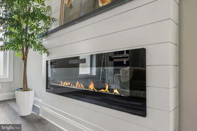 a bathroom with a shower and a sink