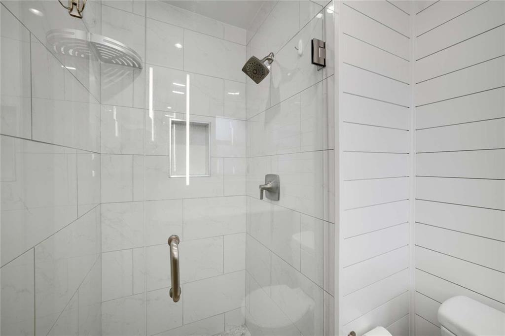 3510 Roswell Road Northwest, Unit M4 Atlanta, GA 30305 - Photo 19 of 23 a bathroom with a shower