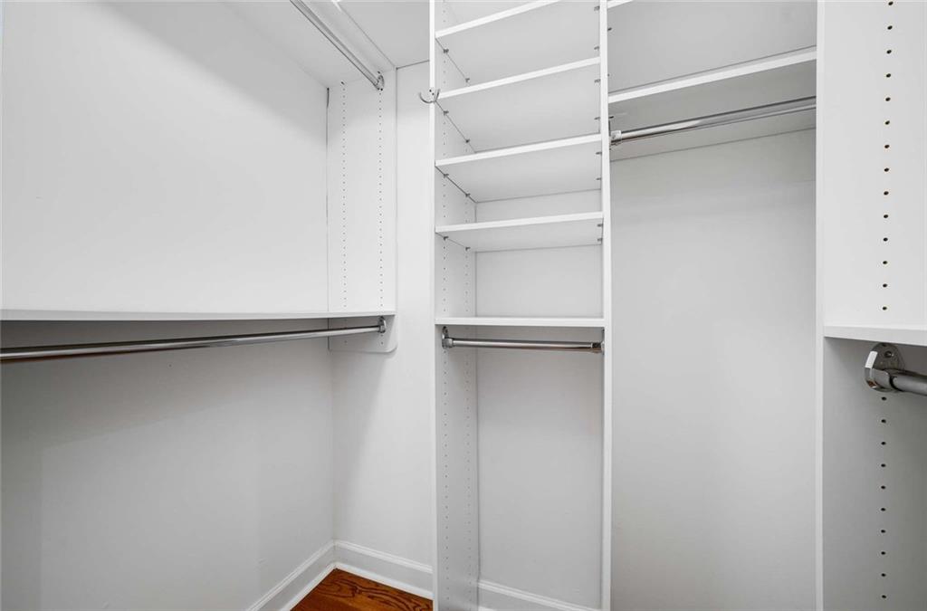3510 Roswell Road Northwest, Unit M4 Atlanta, GA 30305 - Photo 20 of 23 a view of walk in closet with empty racks