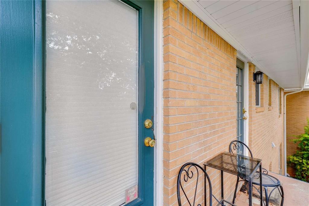 3510 Roswell Road Northwest, Unit M4 Atlanta, GA 30305 - Photo 3 of 23 a balcony view with a door