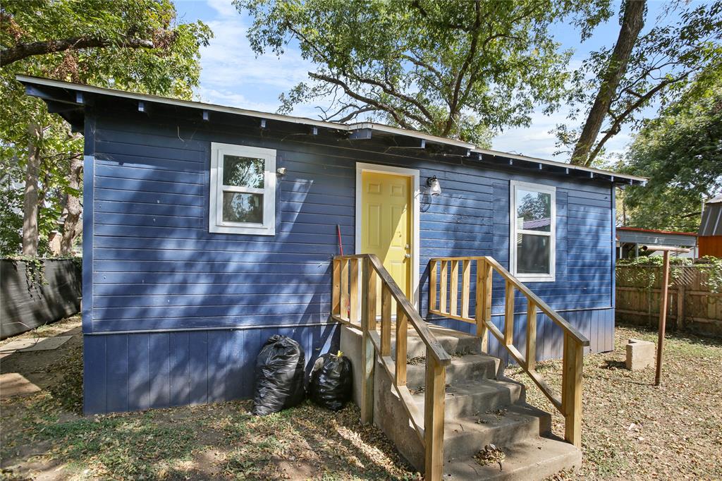504 Preston Street Waco, TX 76704 - Photo 12 of 14 a front view of a house with garden