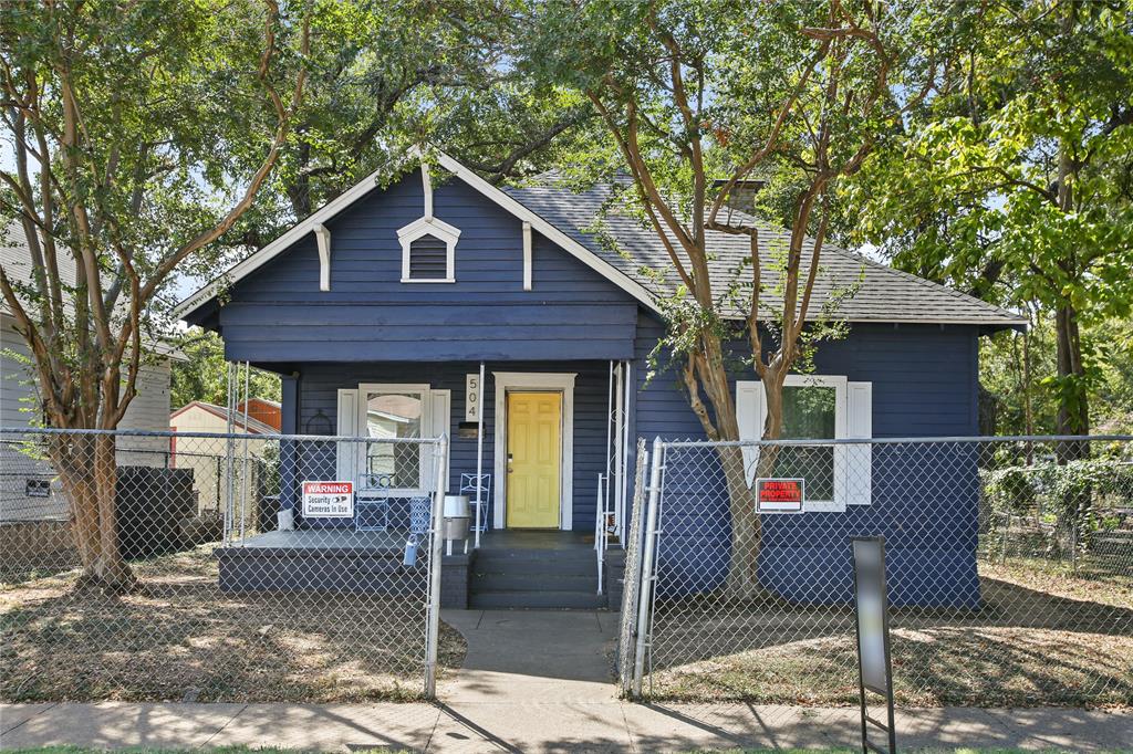 504 Preston Street Waco, TX 76704 - Photo 13 of 14 a front view of a house with garden