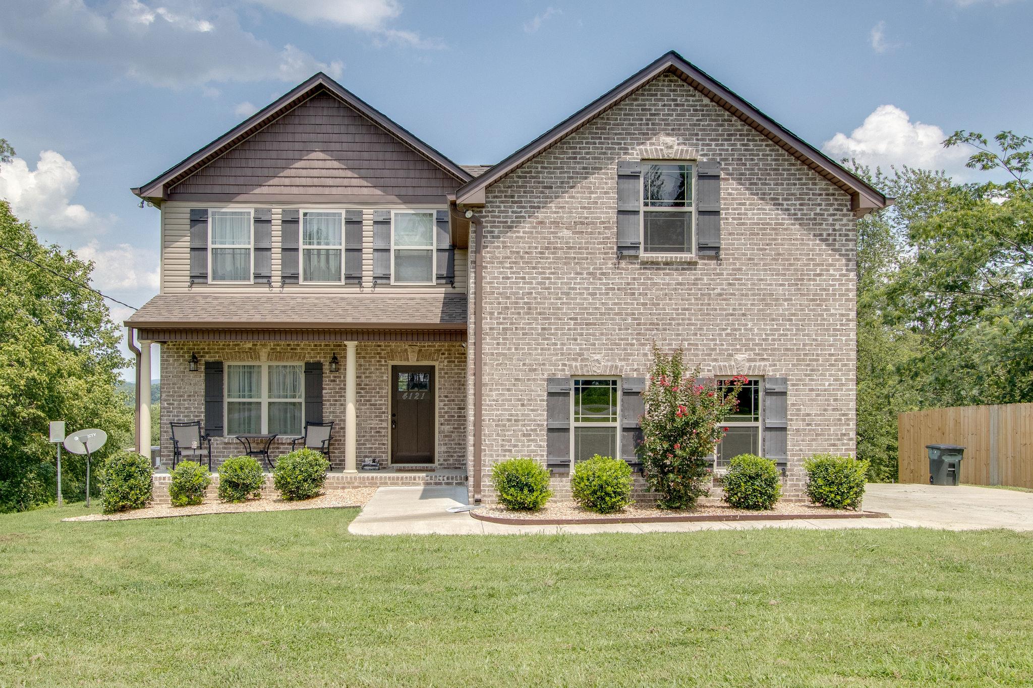 4121 Beasleys Bend Road Lebanon, TN 37087 - Photo 1 of 28 a front view of a house with a yard