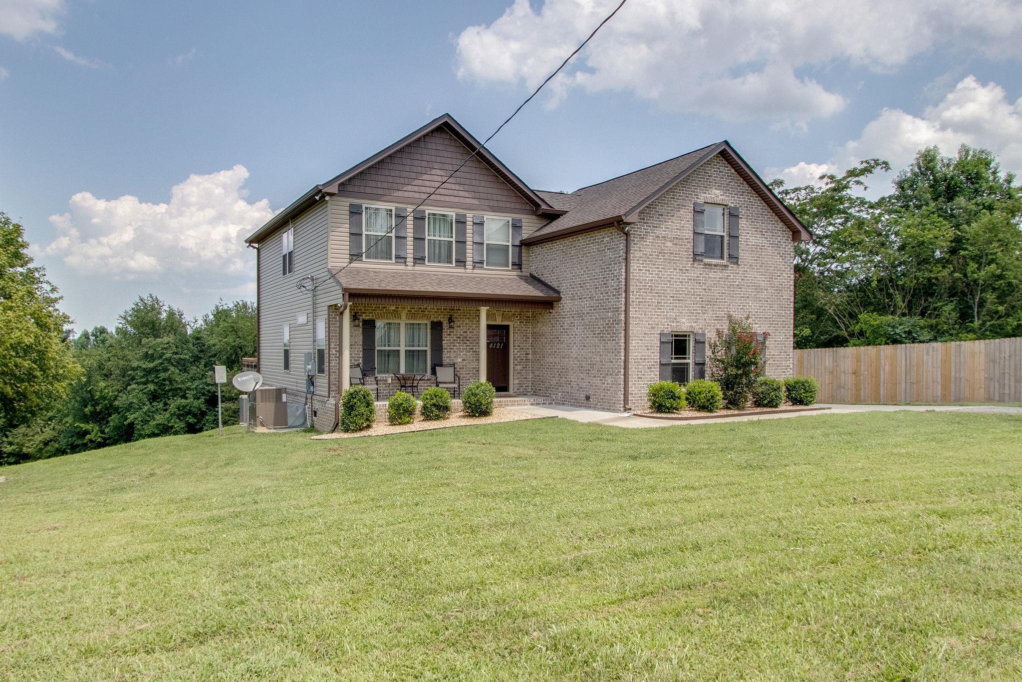 4121 Beasleys Bend Road Lebanon, TN 37087 - Photo 3 of 28 a view of a house with a yard and porch