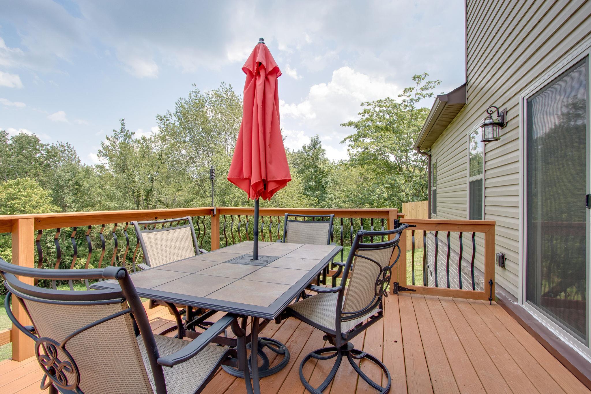 4121 Beasleys Bend Road Lebanon, TN 37087 - Photo 26 of 28 a view of a balcony with a table and chairs