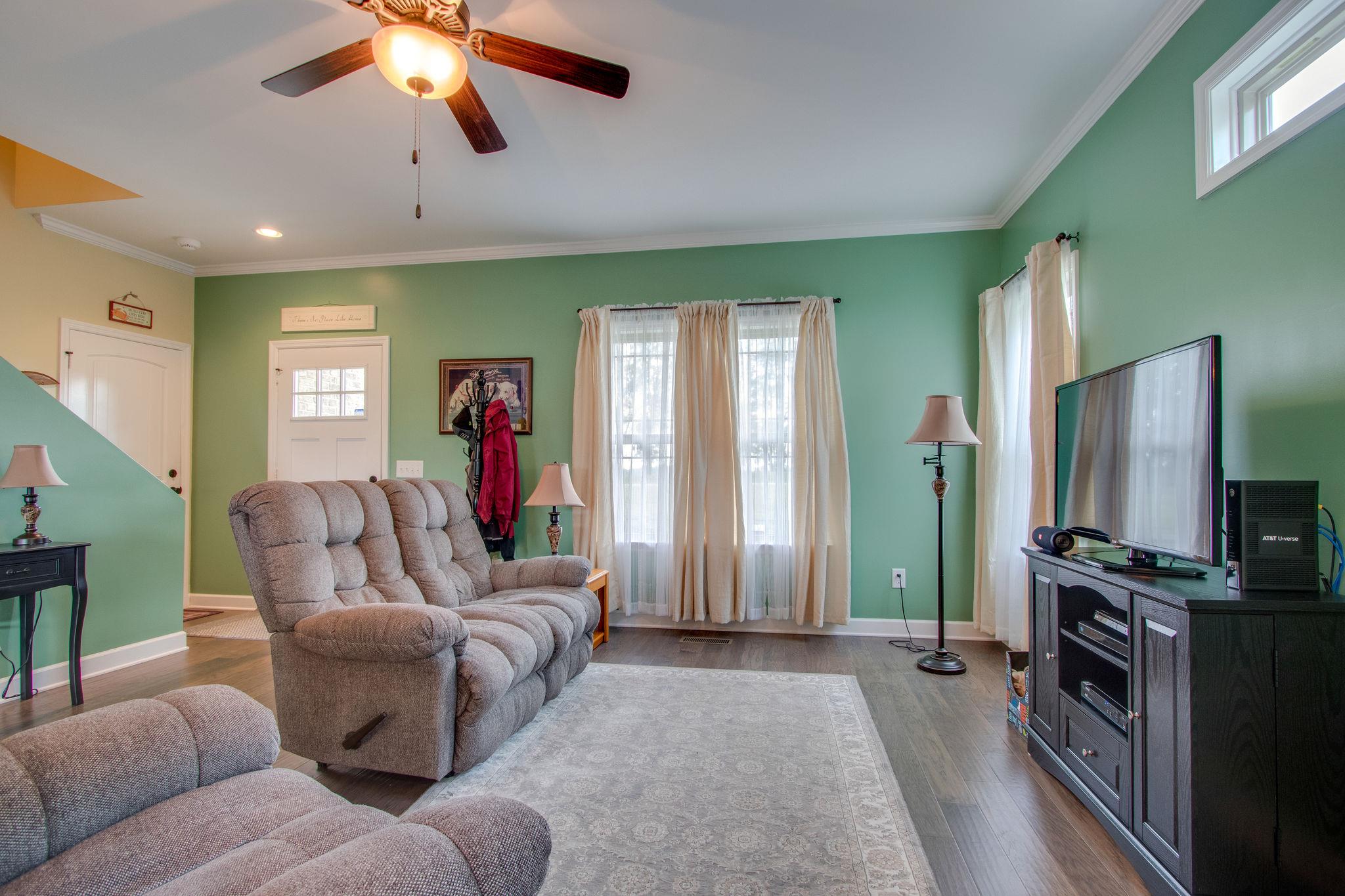 4121 Beasleys Bend Road Lebanon, TN 37087 - Photo 7 of 28 a living room with furniture and a flat screen tv