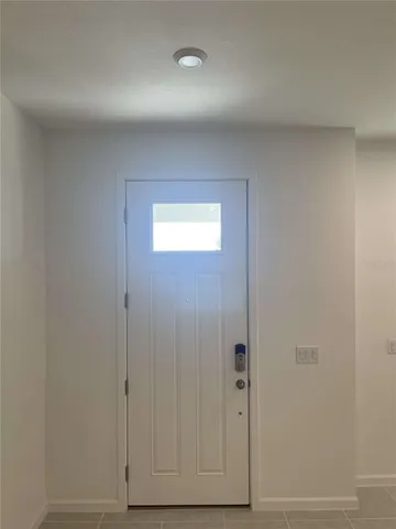 a view of hallway with closet