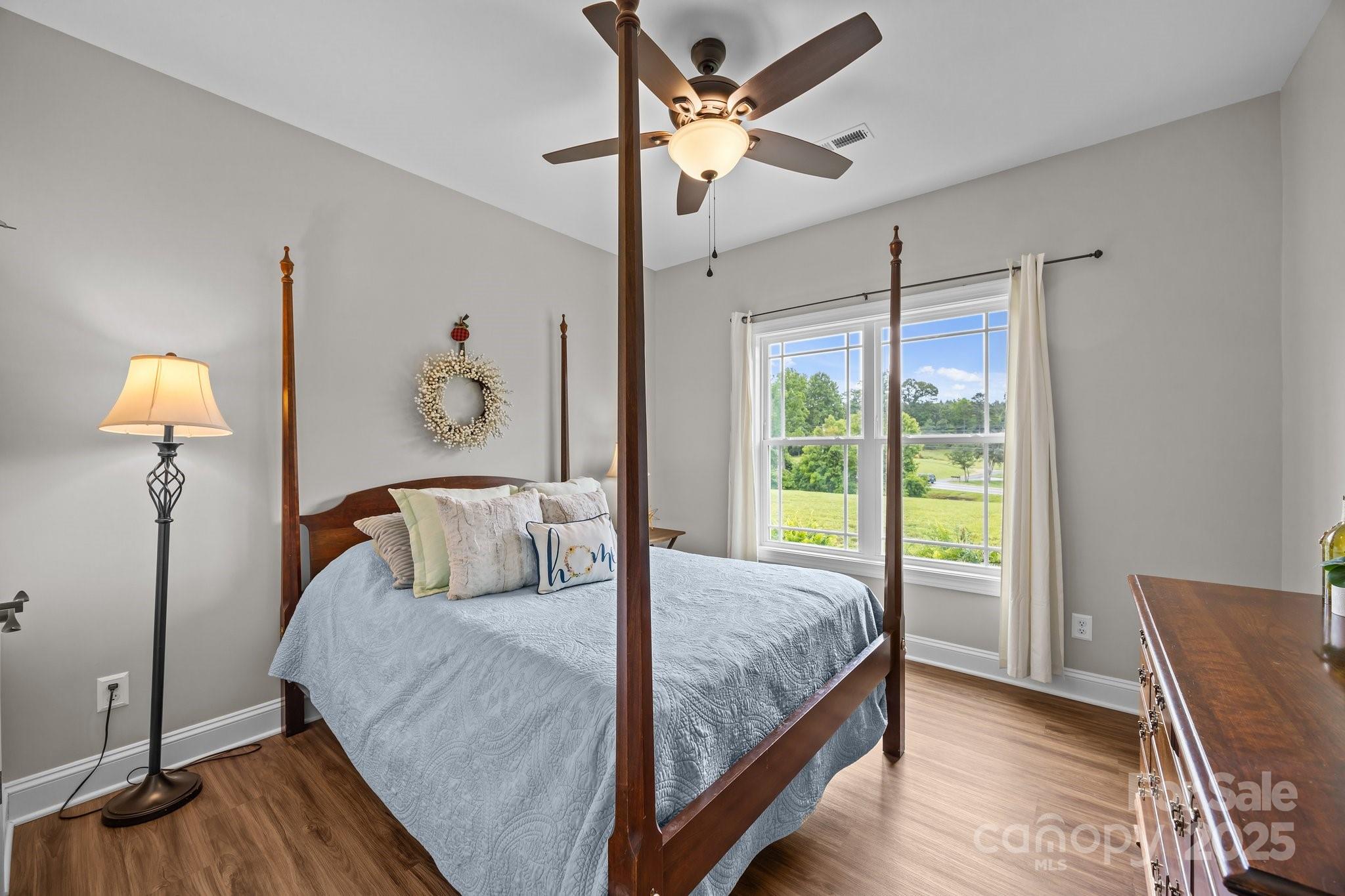 3855 East Holly Grove Road Lexington, NC 27292 - Photo 18 of 42 a bedroom with a bed and a window