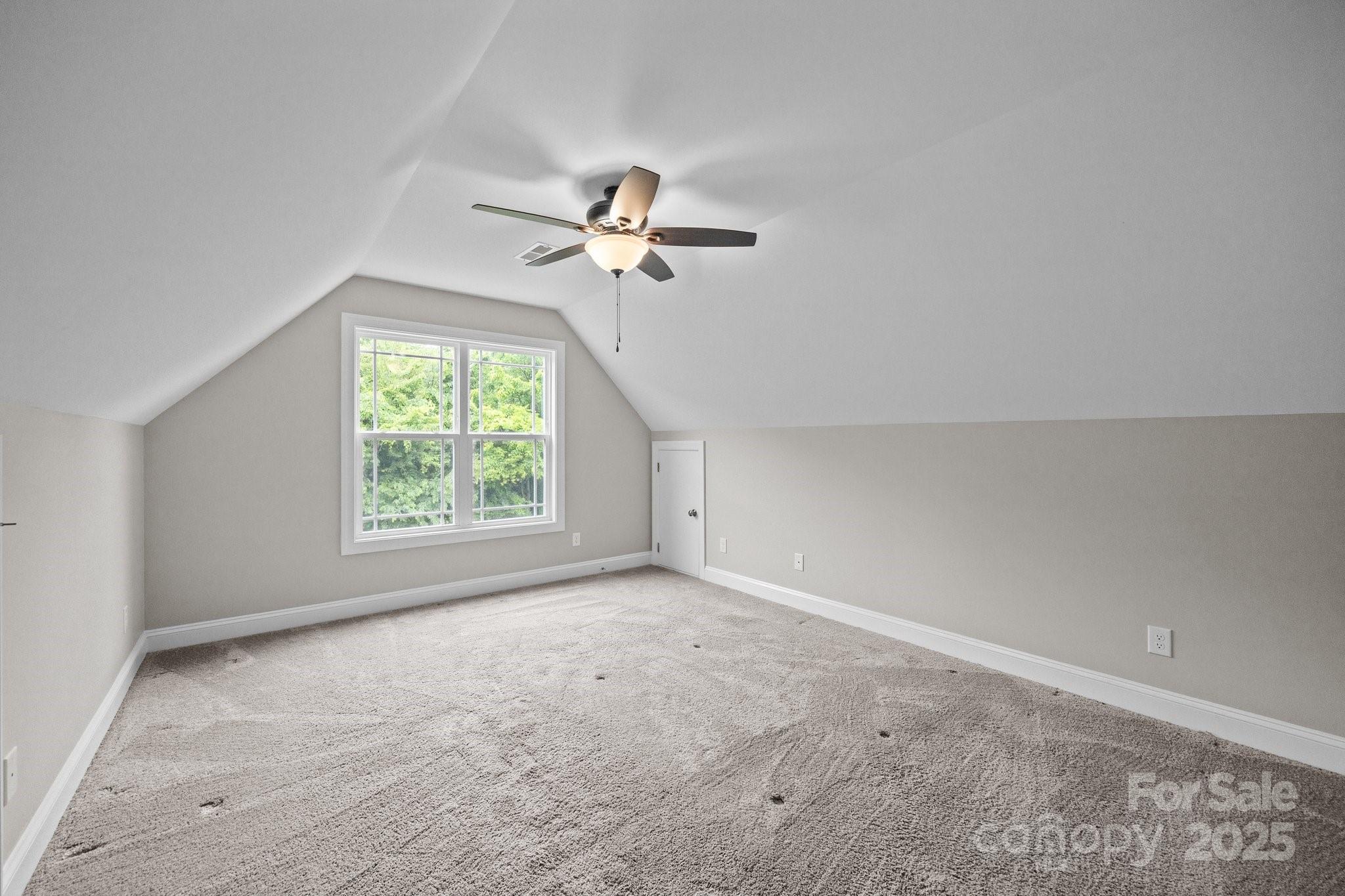 3855 East Holly Grove Road Lexington, NC 27292 - Photo 25 of 42 an empty room with a window