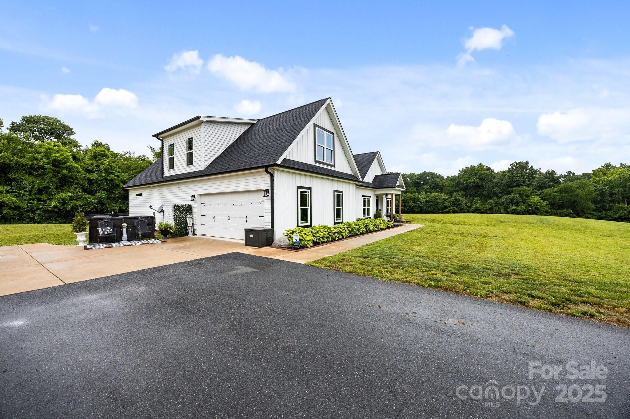 3855 East Holly Grove Road Lexington, NC 27292 - Photo 30 of 42 a view of a house with backyard and garden