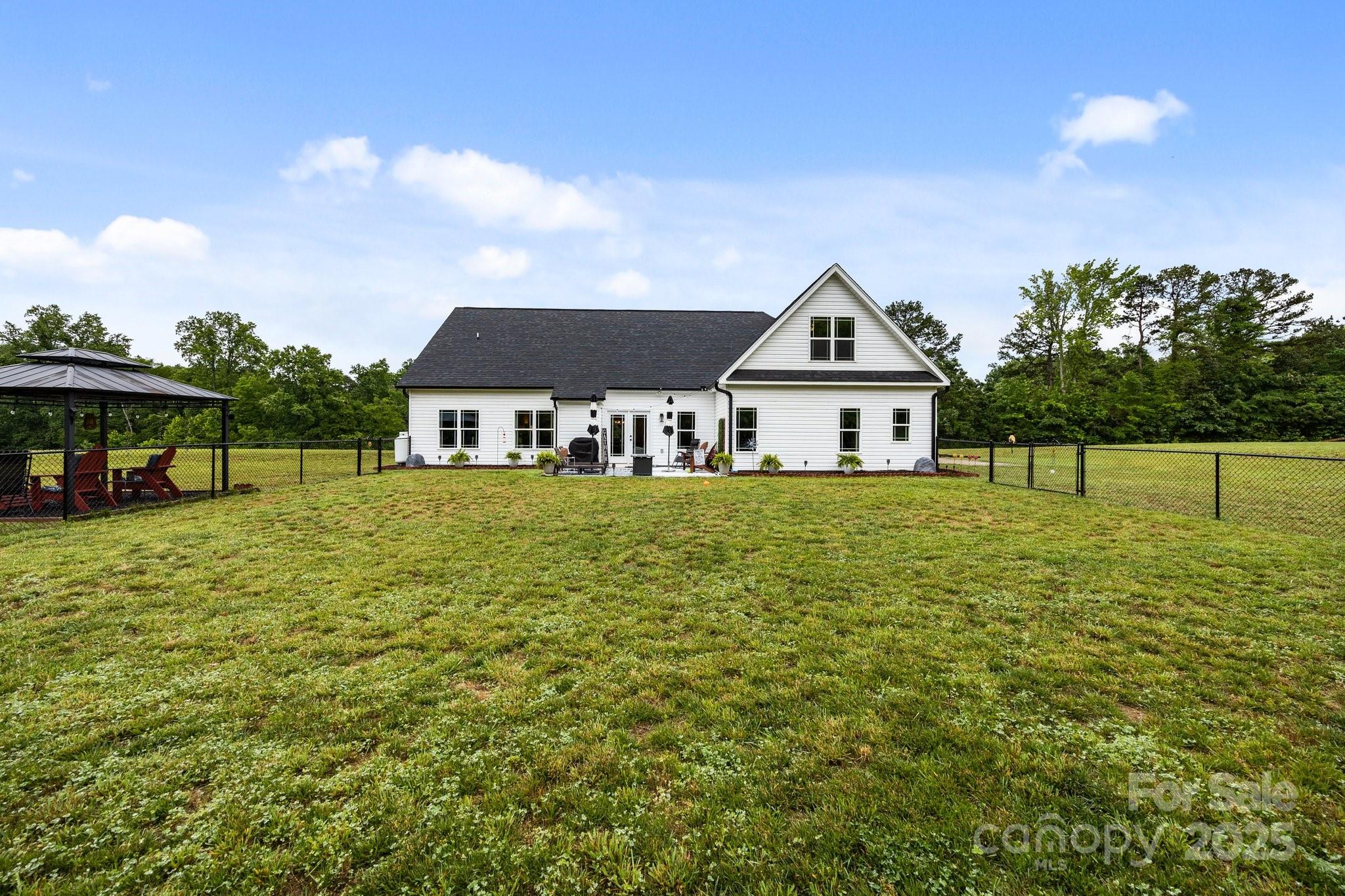3855 East Holly Grove Road Lexington, NC 27292 - Photo 32 of 42 a front view of a house with garden