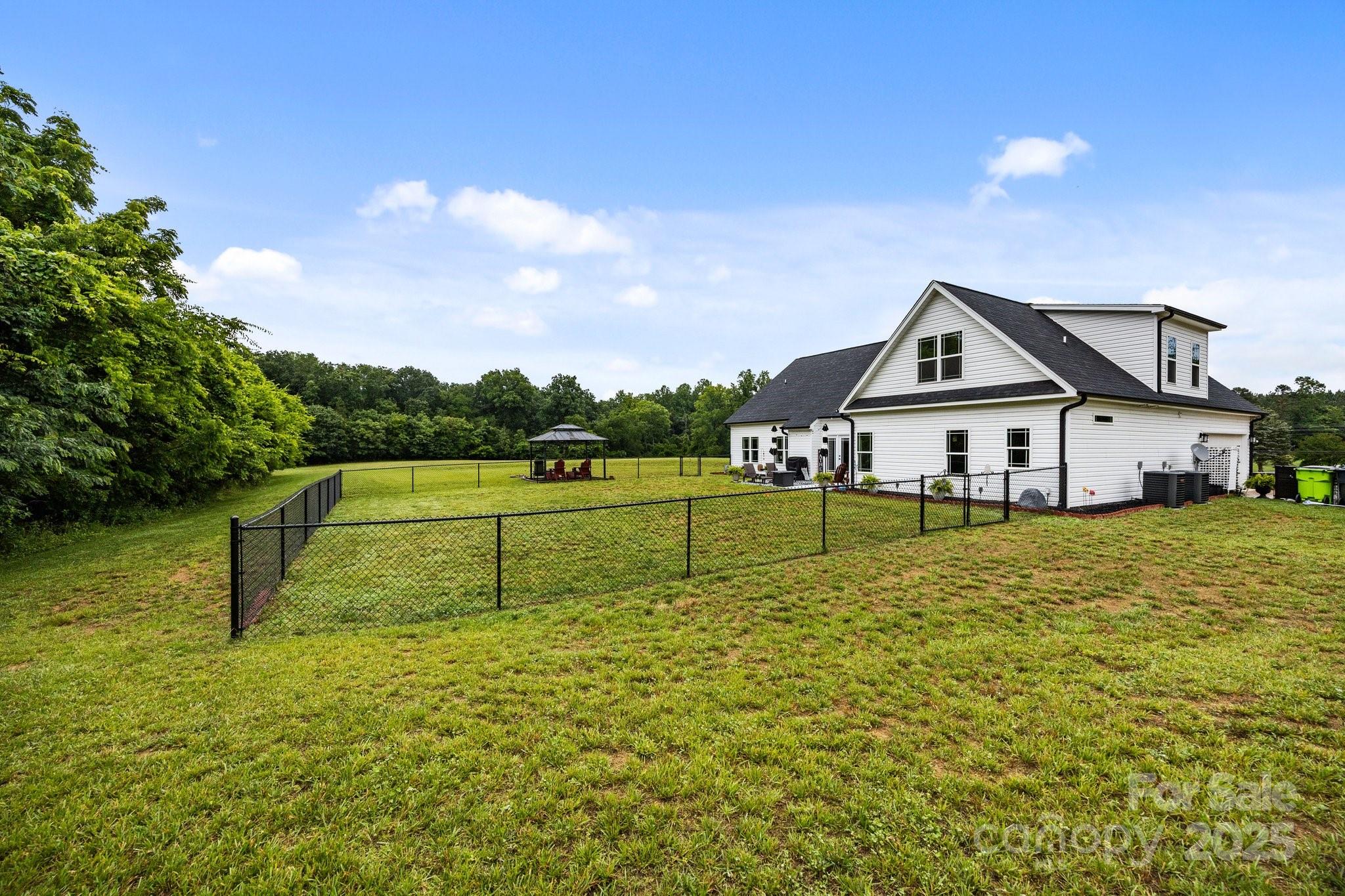 3855 East Holly Grove Road Lexington, NC 27292 - Photo 33 of 42 a view of a house with a park